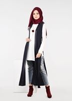 Tesettür giyim LACİVERT YANLARI BAĞCIKLI OMUZLARI KUŞ GÖZÜ DETAYLI ÖRME YELEK 4958 