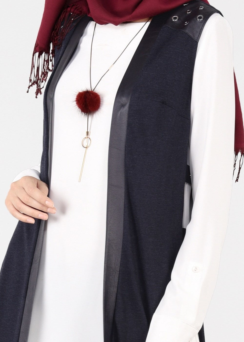 Tesettür giyim LACİVERT YANLARI BAĞCIKLI OMUZLARI KUŞ GÖZÜ DETAYLI ÖRME YELEK 4958 