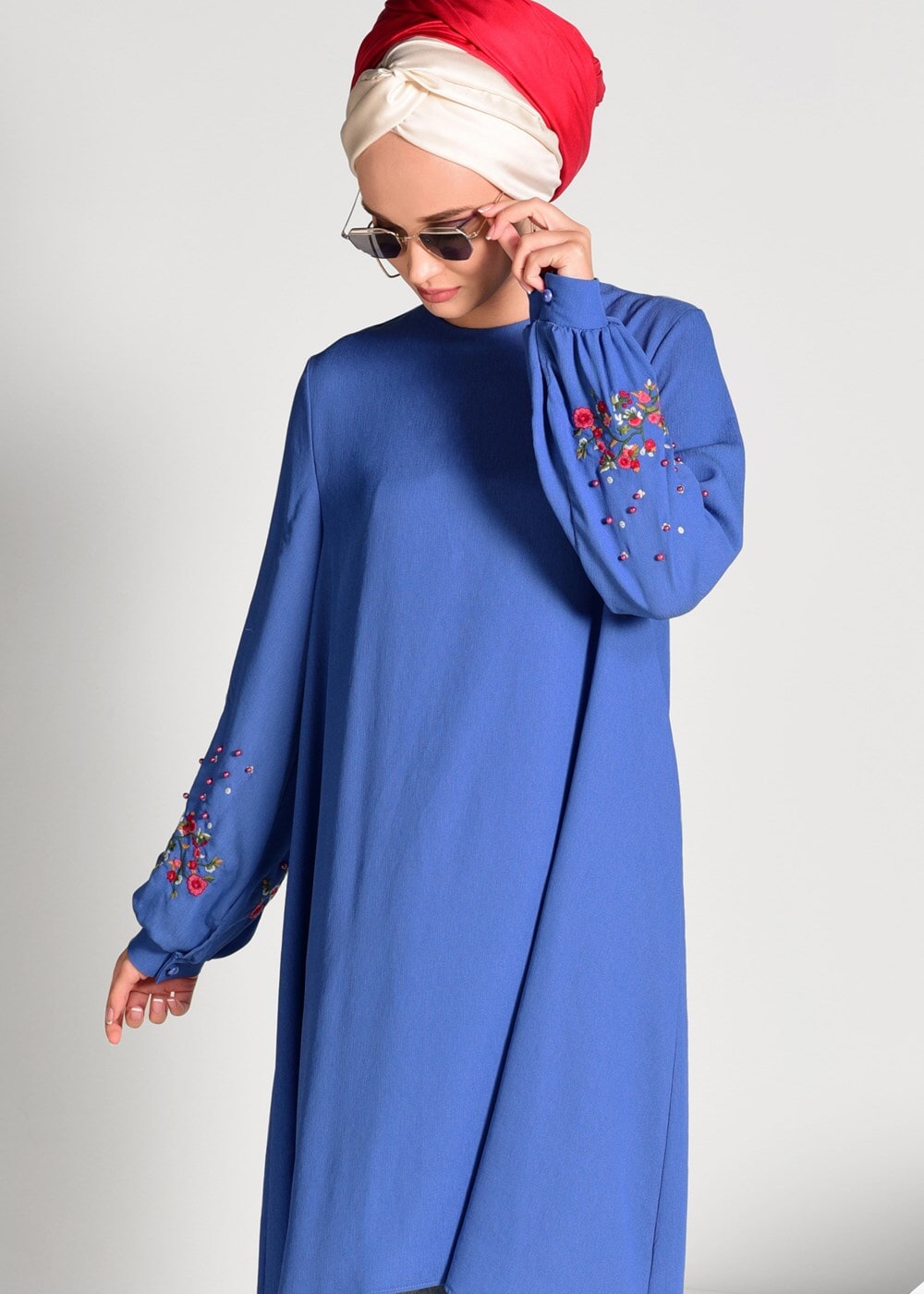 Tesettür giyim LACİVERT NAKIŞ DETAYLI ASİMETRİK KESİM TUNİK 09071