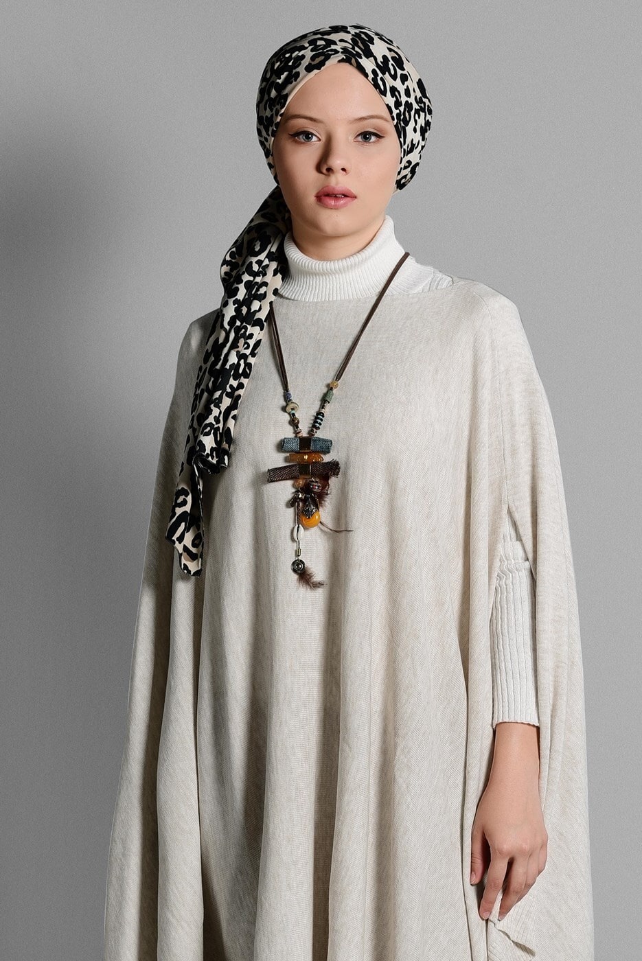 Tesettür giyim BEJ ASİMETRİK TRİKO  PANÇO T 99101