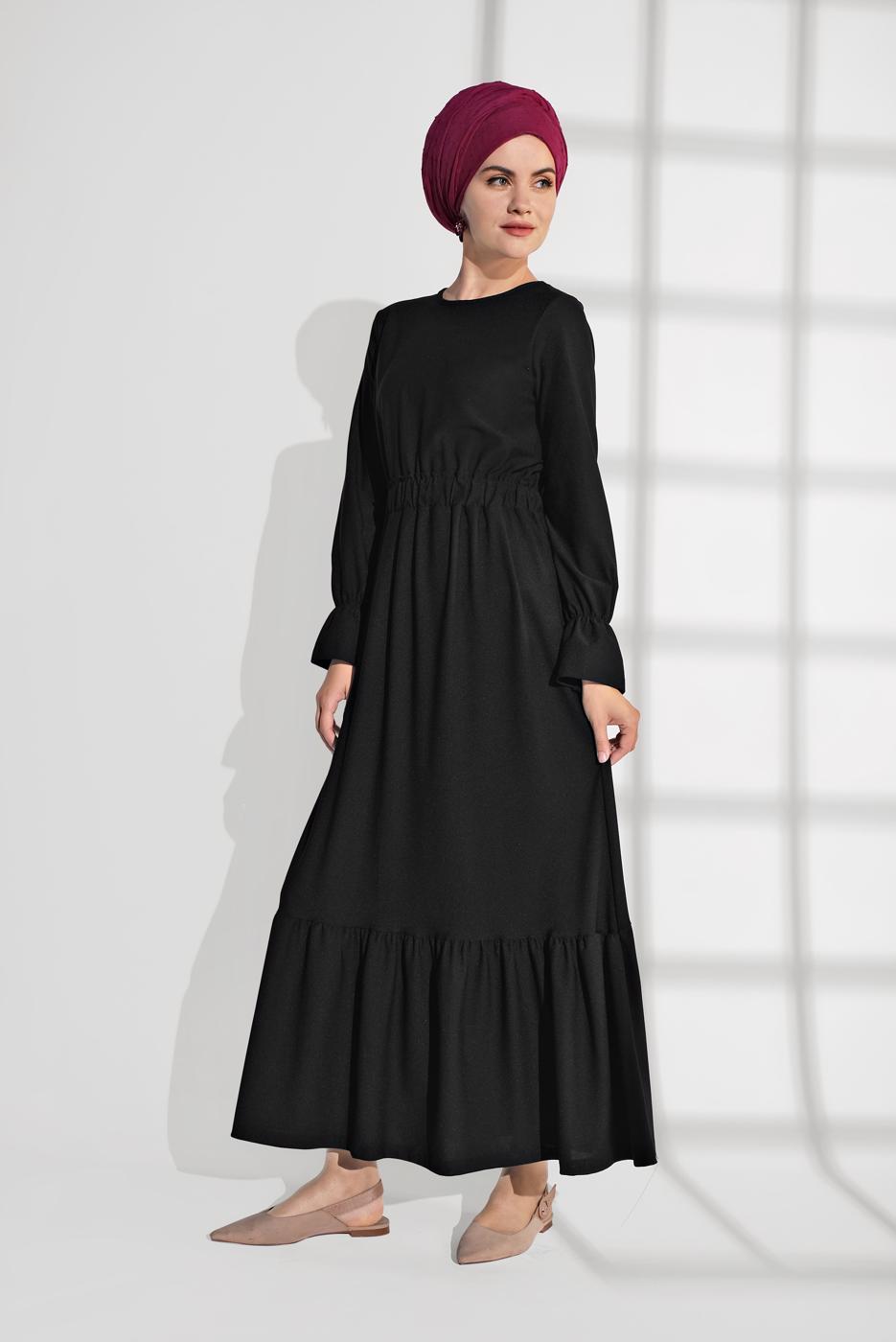 Tesettür giyim SİYAH BELİ LASTİKLİ VOLANLI ELBİSE 9116