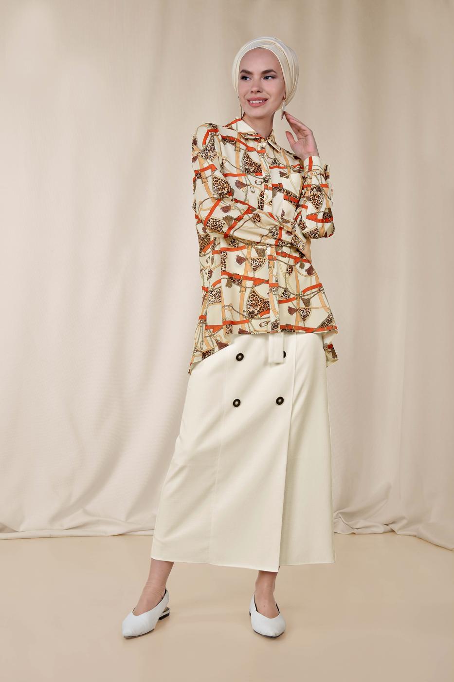 Tesettür giyim KREM ALVİNA ETEK UCU VOLANLI MİX DESENLİ BLUZ 4116