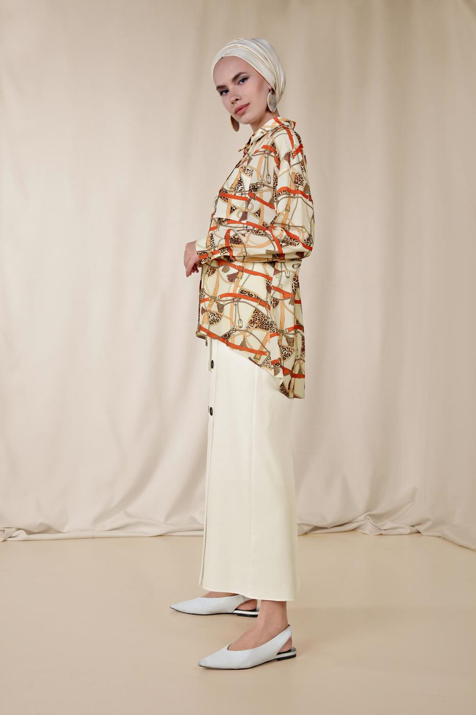 Tesettür giyim KREM ALVİNA ETEK UCU VOLANLI MİX DESENLİ BLUZ 4116