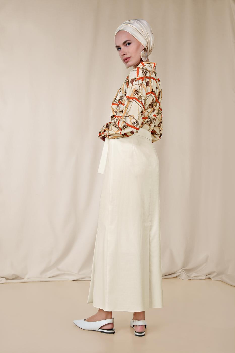 Tesettür giyim KREM ALVİNA ETEK UCU VOLANLI MİX DESENLİ BLUZ 4116