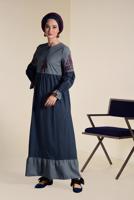 Tesettür giyim LACİVERT İŞLEMELİ VE PÜSKÜLLÜ ELBİSE 4605