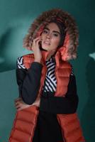 Tesettür giyim TURUNCU KAPÜŞONLU ŞİŞME YELEK 0007