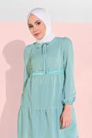 Tesettür giyim MAVİ ALVİNA PÜSKÜL DETAYLI TUNİK 4470