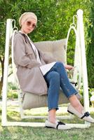 Tesettür giyim BEJ CEP DETAYLI ETEK UCU LASTİKLİ TRENÇKOT 78107