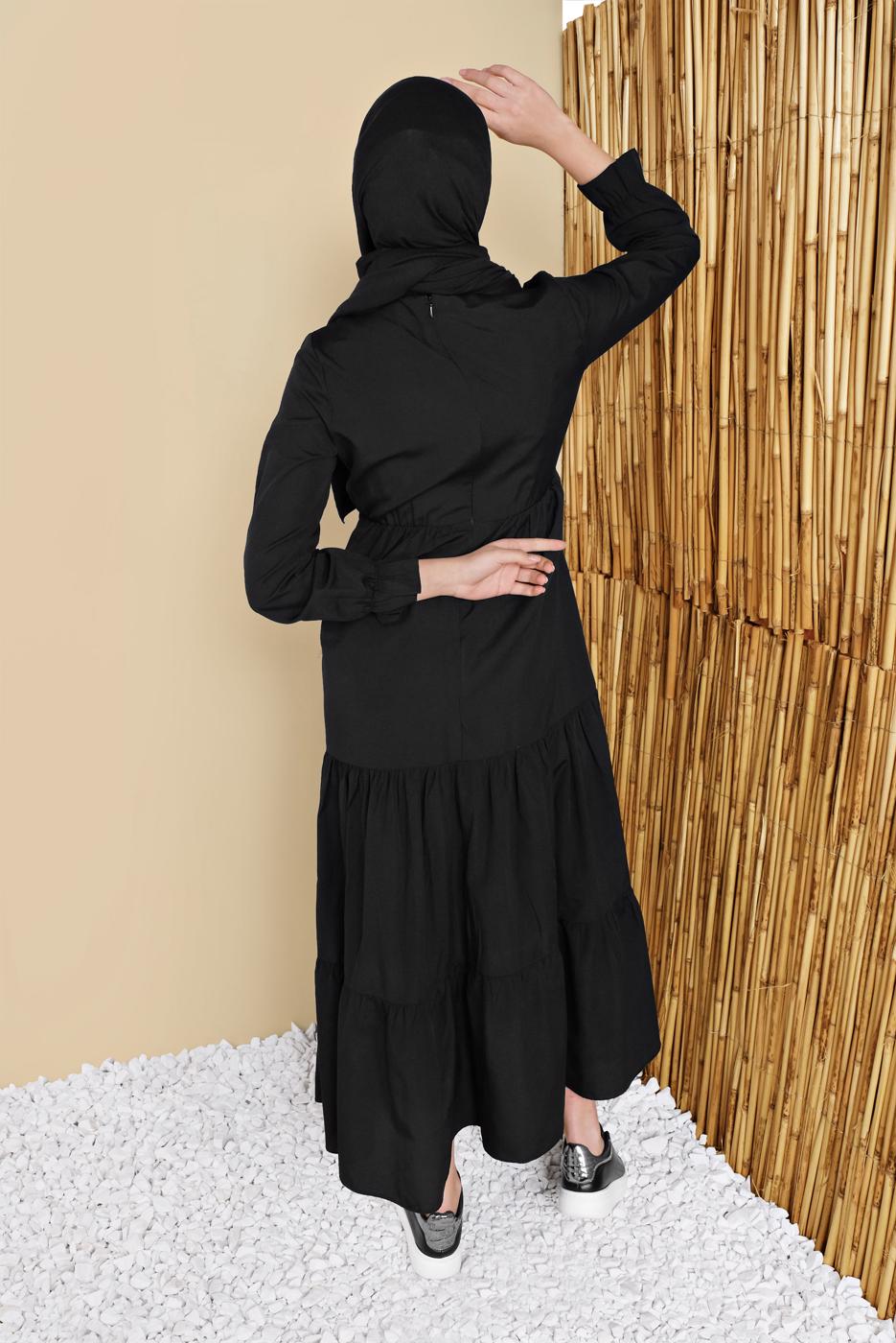 Tesettür giyim SİYAH MANŞETLERİ LASTİKLİ VOLANLI ELBİSE 2534