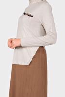 Tesettür giyim BEJ ETEĞİ PİLE GÖRÜNÜMLÜ İKİ RENK TRİKO ELBİSE 41035 