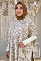 Tesettür giyim EKRU YIRTMAÇLI DESENLİ PANÇO 44112