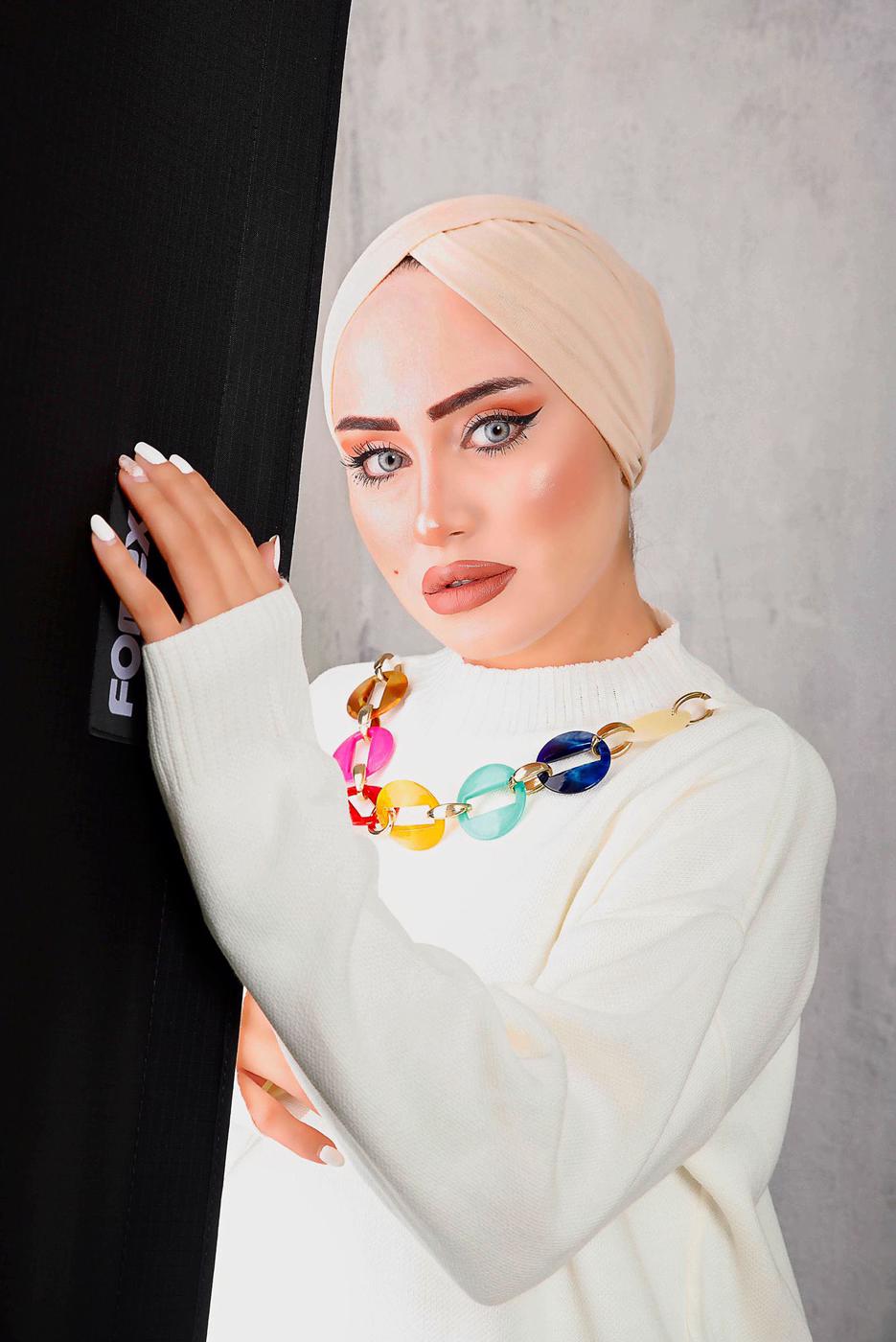 Tesettür giyim EKRU ÖNÜ ZİNCİR DETAYLI TRİKO TUNİK 8592	