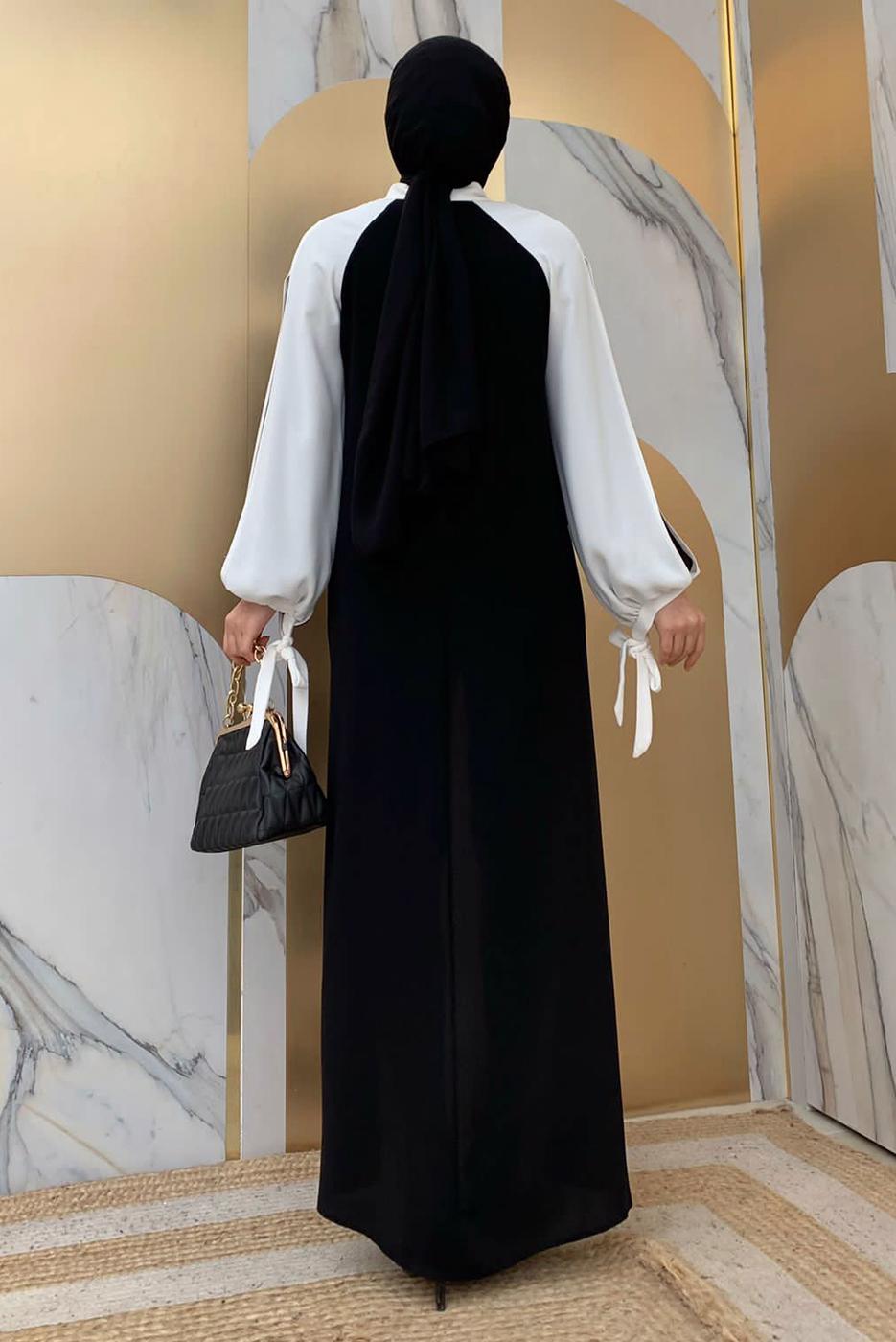 Tesettür giyim SİYAH İKİ RENKLİ MANŞETLERİ BAĞLAMALI ELBİSE T 9973