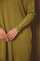 Tesettür giyim YEŞİL DÜĞME DETAYLI TRİKO TUNİK T 5007